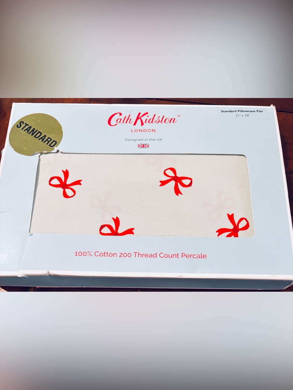 Cath Kidston Sage pilow with Red Bow Print